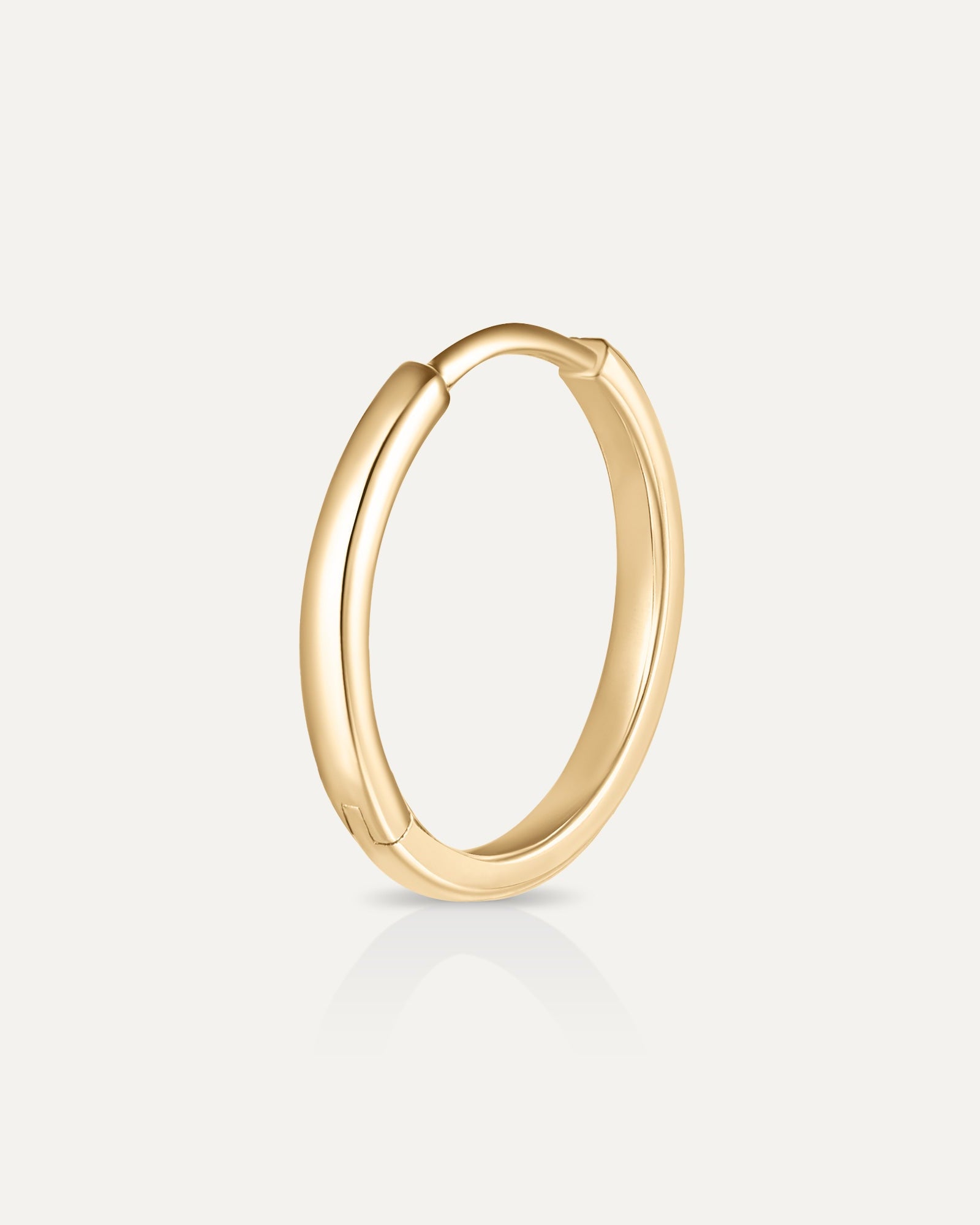 Créole en or jaune recyclé 14 carats et diamant de synthèse