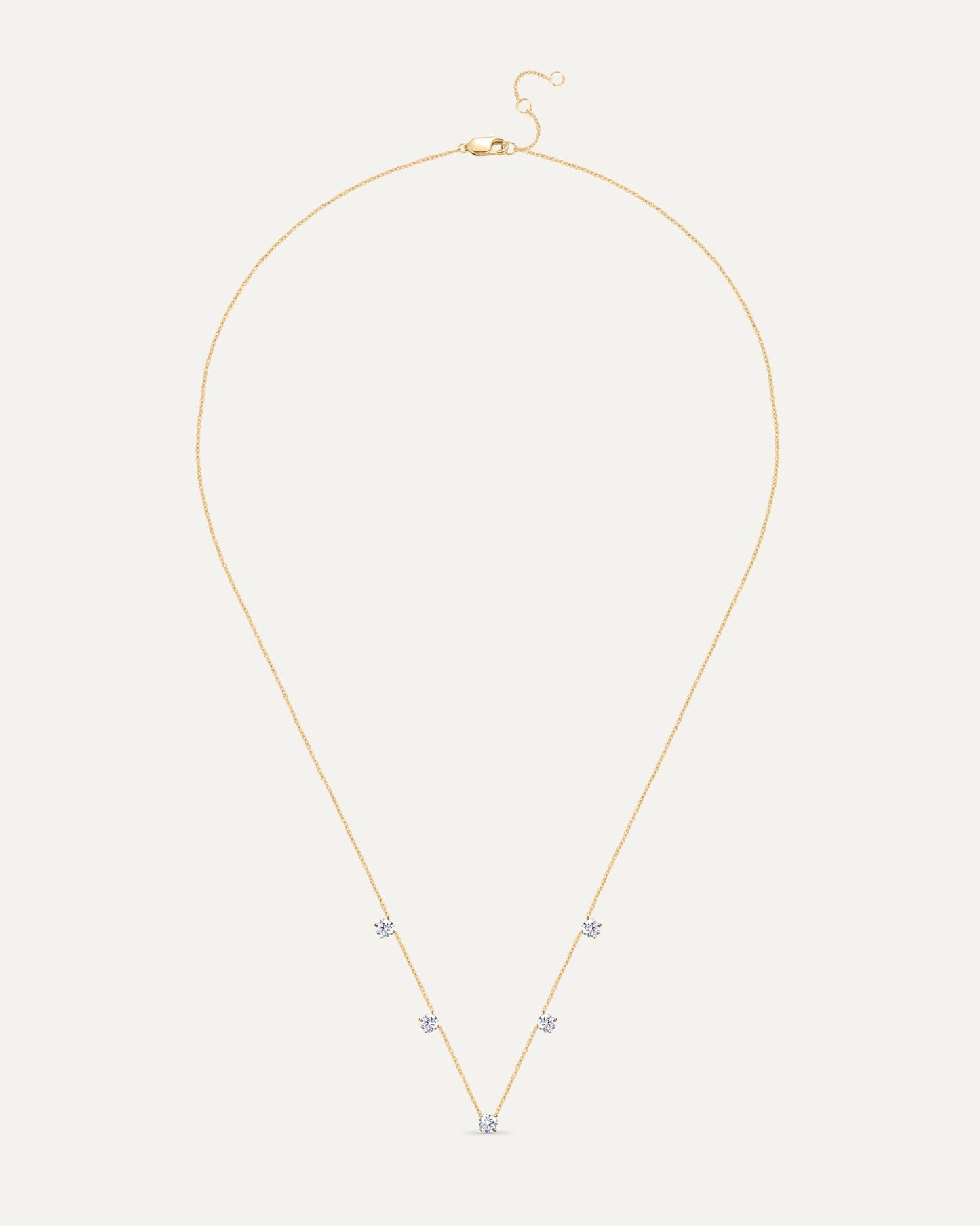 Collier avec cinq diamants en or jaune recyclé 14 carats et diamant de synthèse